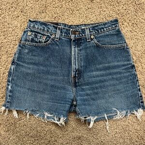 Vintage 90’s Levi’s 512 red tab blue distressed denim shorts